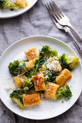 Potato gnocchi with boccoli, rocket and parmesan