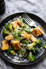 Potato gnocchi with boccoli, rocket and parmesan