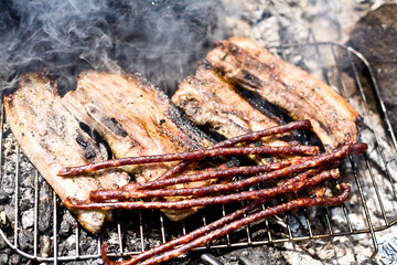 sausages on the grill