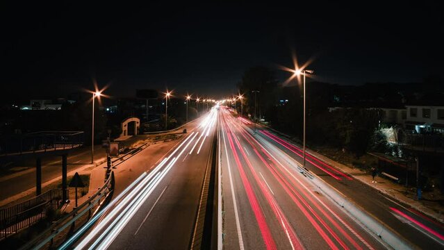 Cinematic Timelapse on a highway at night in Spain