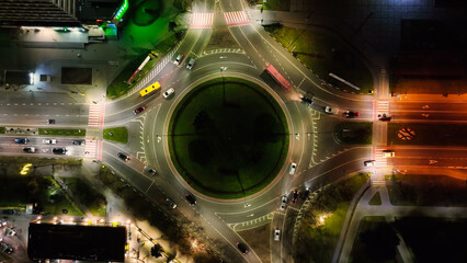 Aerial top view Night timelapse of roundabout cars at the rounda