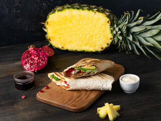 Hawaiian BBQ chicken wrap with pineapple and grapefruit