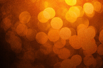 Abstract bokeh light brown and yellow colors defocused circular summer background. Christmas light...