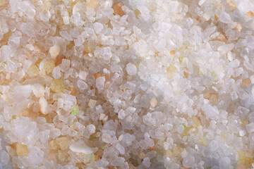 Pink Himalayan bath salt close-up. Spa and relaxation for the body. Wellness procedures.
