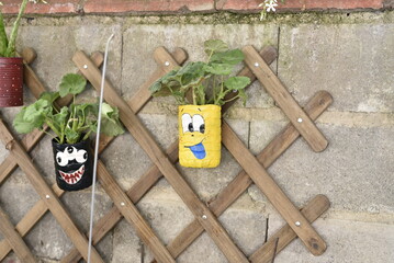 hand-painted recycled flower pots