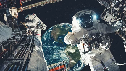 Wall murals Nasa Astronaut spaceman do spacewalk while working for spaceflight mission at space station . Astronaut wear full spacesuit for operation . Elements of this image furnished by NASA space astronaut photos .