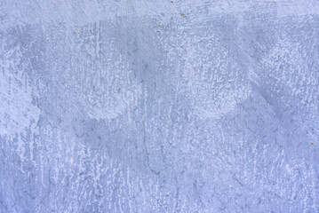 Texture of a metal wall with cracks and scratches which can be used as a background
