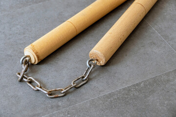 nunchaku, one of the close-up martial arts of the far east- nunchaku, made of handmade wood and chain,
