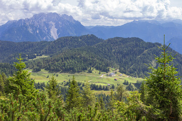 Fototapeta na wymiar Mountain summer landscape. Aerial view of the valley and the eastern Marmarole from the path to Ciareido refuge, Cadore, Italy.
