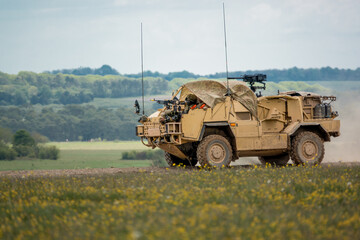 British army Supacat Jackal 4x4 rapid assault, fire support and reconnaissance vehicle on a...