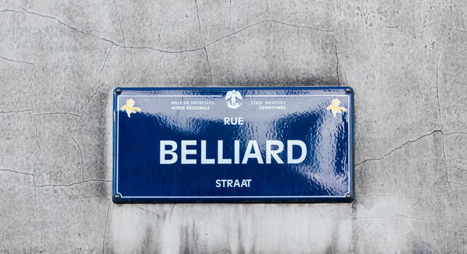 City of Brussels / Belgium - Streetname tag on a brick facade of the Belliard street in the European and business quarter