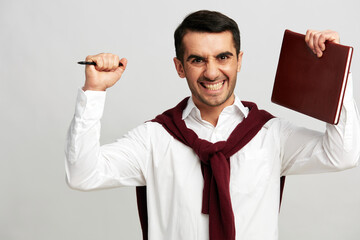 handsome man notepad with pen smile emotions business and office concept