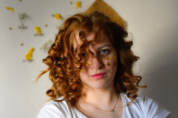 portrait of a woman with curly hair