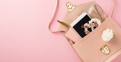 Top panoramic view photo of woman's day composition open pink leather bag smartphone scrunchies...