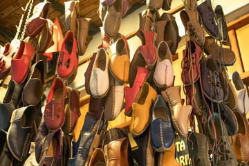 Traditional colorful and handmade shoes in Gaziantep, Turkey. Traditional, handmade leather shoes' local name is "Yemeni" in Gaziantep, Turkey.