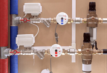 Water meters in the plumbing system. Water flow measurement.