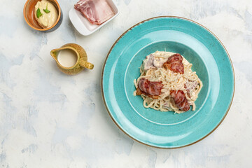 Pasta Carbonara bacon, cheese and cream sauce served in the restaurant. Restaurant food. banner, menu, recipe place for text, top view