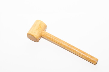 Wooden gavel hammer isolated on white background. Gavel on desk, legal law symbol 