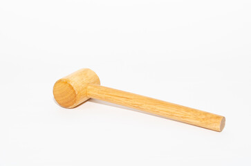 Wooden gavel hammer isolated on white background. Gavel on desk, legal law symbol 