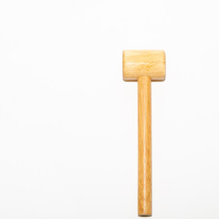 Wooden gavel hammer isolated on white background. Gavel on desk, legal law symbol 