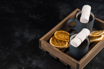 Coffee on wood plate with coffee beans