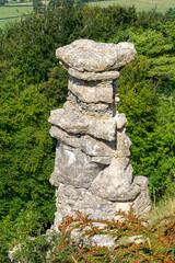 The devil's chimney rock formation on Leckhampton Hill, Cheltenham