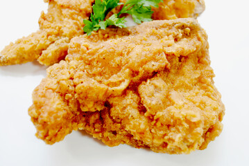 Close Up of a Crispy Southern Fried Chicken Thigh