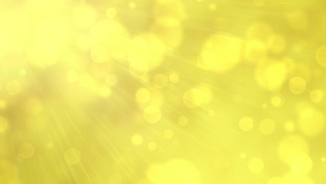 Yellow abstract background with shining sunlight rays with sunbeams. Animated background with blurred circle shapes. Moving greeting card with copy space for invitation to happy birthday even, loop.
