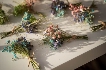 small cute beautiful bouquets of dried flowers