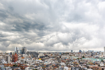 Shinjuku, Tokyo ward area dark gloomy stormy sky cityscape aerial above high angle view of...