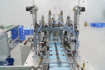 MANUFACTURE OF SURGICAL MASKS - FABRICATION DE MASQUES CHIRURGIC