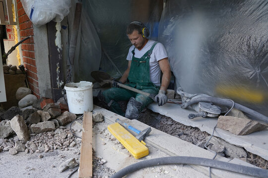 Working with renovering home sewege pipe.