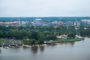 Aerial view of Alexandria cityscape in Northern Virginia cloudy day near Washington DC Potomac...