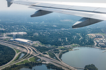 Plane aerial drone view of cityscape near Oxon Hill in Washington DC with i495 highway capital beltway outer loop with traffic cars and buildings - obrazy, fototapety, plakaty