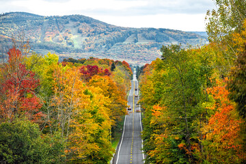West Virginia road highway with many cars traffic in colorful autumn fall near Blackwater Falls...