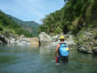 Sunny view of the landscape during a river tracing event