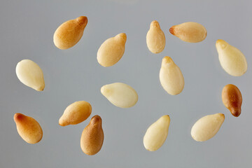 sesame seeds on grey background