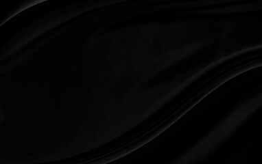 Black gray satin dark fabric texture luxurious shiny that is abstract silk cloth background with patterns soft waves blur beautiful.