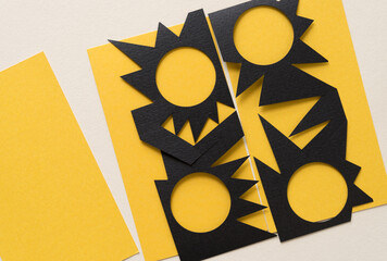 background with irregular paper shapes on yellow rectangles