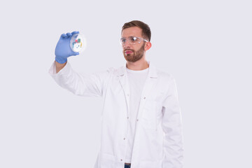 Man Doctor Examing Petri Dish Wearing Glasses Isolated. Medicine, Science Concept