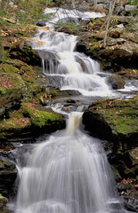 Scenic waterfall near Wilton, New Hampshire. Portion of Garwin Falls cascading down steep rocky ravine located just upstream from main waterfall.