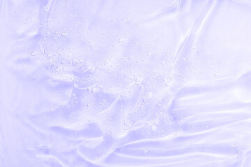 Lilac mask smear smudge. Gel serum liquid, cream with collagen and retinol, ceramide sample. Hyaluronic acid toner with retinol and ceramide, jelly texture cosmetic product. Close-up, macro.