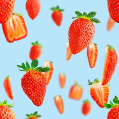 Fresh strawberry seamless pattern. Ripe strawberries isolated on blue. Package design background. Falling strawberry selective focus.