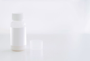 medicine bottle with dry powder in plastic package