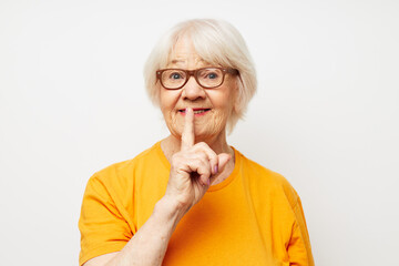 emotional elderly woman vision problems with glasses isolated background