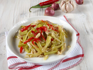 Stir fry or sauteed chayote squash or tumis labu siam is Indonesian daily dish. Simple and easy to...