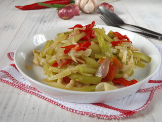 Stir fry or sauteed chayote squash or tumis labu siam is Indonesian daily dish. Simple and easy to...