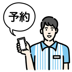 スマホを持ってオンライン予約の説明をしているコンビニ店員の若い男性
