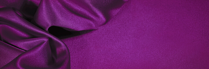 Fototapeta na wymiar Plum purple silk satin. Soft wavy pleats. Shiny fabric. Luxury background with copy space for design. Web banner. Valentine, anniversary, festive concept.