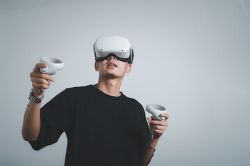 Surprised teen male student use vr glasses and looks at empty copy space .Virtual gadgets for...